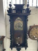 Clocks: Art Nouveau regulator with brass face and stylised spandrels. 43ins.