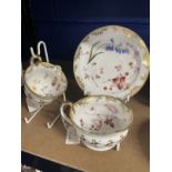 Ceramics: Swansea style trio c1815-18, comprising a teacup, coffee cup and saucer, painted
