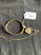 Jewellery: Yellow metal trace link chain with an engraved heart shaped locket, 20ins. Plus a plain