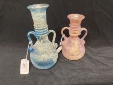 Roman style glass bottle vases blue and pink with side handles.