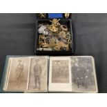 Militaria: Album of mixed Carte d'Visite postcards and photographs relating to WWI soldiers, nurses,