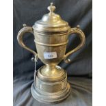 Hallmarked Silver: Trophy, double scroll handles with cover attached. Height including cover 9ins.