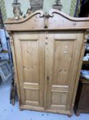 20th cent. Stripped pine Continental wardrobe, two doors. Approx. 77ins. x 49ins. x 21ins.