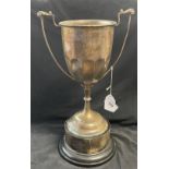 Hallmarked Silver: Trophy, double handles attached to a plastic plinth. Total weight including