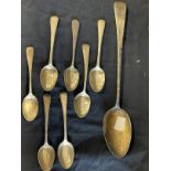 Hallmarked Silver: Basting spoon, London 1830 and seven teaspoons. 7.3oz.