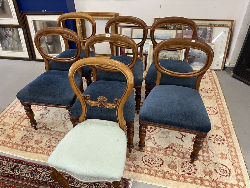 Set of six Victorian mahogany balloon back dining chairs plus one hoop back.