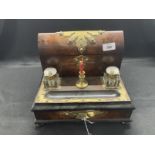 19th cent. Walnut and ebonised desk set comprising letter rack, inkwells, candlestick, with brass