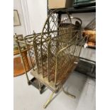 20th cent. Brassware: Net paper or magazine rack, umbrella stand and armorial coal purdonium.