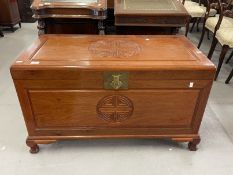20th cent. Camphor trunk, carved front and lid which lifts to reveal sliding tray. With original