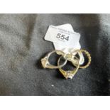 Hallmarked Jewellery: Three 9ct dress rings, sizes O, R and N. Total weight 7.2g.