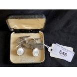 Jewellery: White metal cufflinks set with mother of pearl, stamped silver. Plus a pair of