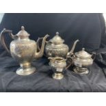 White metal Swiss silver stamped 800 four piece tea set, leaf and bead pattern. Total weight 54.