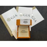 Hallmarked Jewellery: Ring set with three brilliant cut diamonds, weight of one 0.50ct, colour K