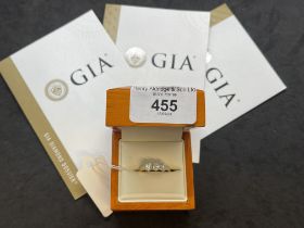 Hallmarked Jewellery: Ring set with three brilliant cut diamonds, weight of one 0.50ct, colour K