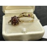 Hallmarked Jewellery: 18ct gold boat shaped ring set with one diamond and ten rubies, ring size O.