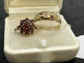 Hallmarked Jewellery: 18ct gold boat shaped ring set with one diamond and ten rubies, ring size O.