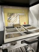 Flatware: German SBs Bestecke Solingen, chrome nickel steel cutlery set with gold plated highlights.