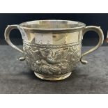 Silver & Plated Ware: George II white metal two handled loving cup with embossed swan decoration,