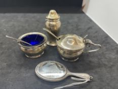 Hallmarked Silver: Three-piece condiment set with spoons and blue glass liners, plus a dressing