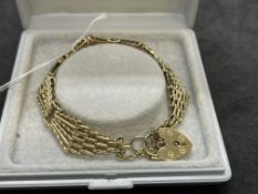 Hallmarked Jewellery: 9ct gold fancy link gate bracelet. Length 7ins. Width at widest point ½ins.