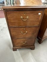Georgian mahogany three narrow drawer chest of drawers on bracket supports, with original brass