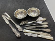 Hallmarked Silver: Two finger bowls, two fruit knives, fork, and other items. Total weight 6.97oz.