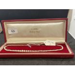 Jewellery: Necklet single row of (87) graduated cultured pearls with a silver clasp, pearls