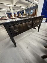 18th cent. Oak and elm serving table, two wide drawers, on four swept supports.