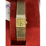 Watches: Hallmarked ladies 9ct gold Omega integral bracelet watch, 15mm square champagne coloured