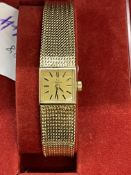 Watches: Hallmarked ladies 9ct gold Omega integral bracelet watch, 15mm square champagne coloured