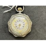 Watches: Silver ladies pendant watch, heart shaped dial flecked with gold elaborate chased case
