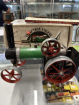 Toys/Models: Mahod steam tractor with box (slightly distressed) and paraffin burner.