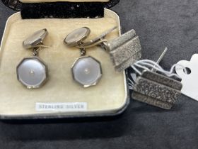 Jewellery: White metal cufflinks set with mother of pearl, stamped silver. Plus a pair of