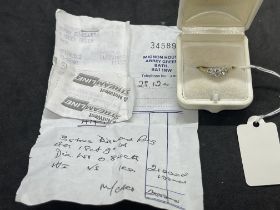 Hallmarked Jewellery: 18ct gold three stone graduated diamond ring, known weight of diamonds 0.84ct.