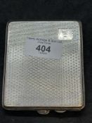 Hallmarked Silver: Cigarette case assayed Birmingham 1927 J C Ltd chased decoration to case. 5oz.