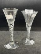 18th cent. Wine glasses drawn trumpet bowls one on a mercury spiral stem, the other air twist