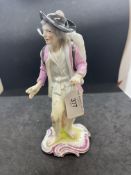 A Frankenthal figure of a pedlar c1760, modelled by J W Lanz, a large tied sack strapped to his