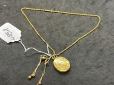 Jewellery: Yellow metal oval hinged locket on a 16ins rope link chain, plus a pair of ball and chain