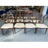 19th cent. Mahogany dining chairs including two carvers, lyre back with matching carving,