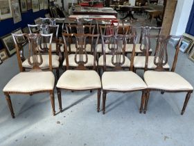 19th cent. Mahogany dining chairs including two carvers, lyre back with matching carving,