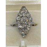 Jewellery: Early 20th cent. marquise cut graduated diamond ring. The ring and mount test as