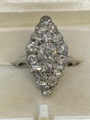 Jewellery: Early 20th cent. marquise cut graduated diamond ring. The ring and mount test as