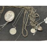 Hallmarked Jewellery: Six silver chains, one with an oval locket attached, one wit a St.