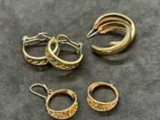 Jewellery: Yellow metal three pairs of hoop earrings, test as 9ct gold. Total weight 10.8g.