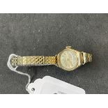 Watches: 9ct gold rotary round silver coloured dial with Arabic numerals on a gold plated