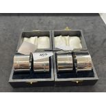 Hallmarked Silver: Two pairs of plain napkin rings, cased. Total weight of (4) 5.99oz.