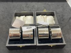 Hallmarked Silver: Two pairs of plain napkin rings, cased. Total weight of (4) 5.99oz.