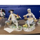 20th cent. Ceramics: Dresden figures, he seated with a cockerel, she feeding a hen and chicks, a