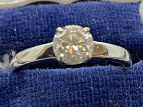 Jewellery: White metal ring set with a single brilliant cut diamond, weight 1.01ct, colour L,