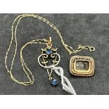 Jewellery: Edwardian 9ct (tested) pendant set with blue stones plus small mourning brooch.